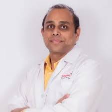 Dr Siraj Basade